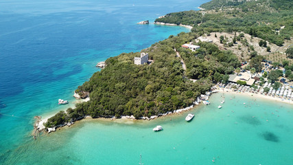 Aerial drone bird's eye view photo of iconic paradise sandy beaches with turquoise sea in complex islands of Agios Nikolaos and Mourtos in Sivota area, Ionian sea, Epirus, Greece