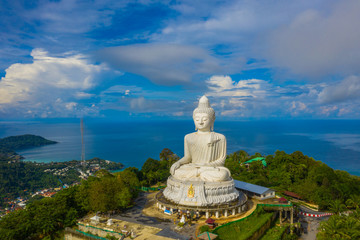 Fototapeta na wymiar areial view white cloud in blue sky at Phuket big Buddha. .Phuket Big Buddha is one of the island most important and revered landmarks on the island.