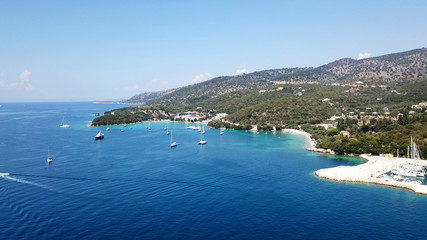 Fototapeta premium Aerial drone bird's eye view photo of iconic paradise sandy beaches with turquoise sea in complex islands of Agios Nikolaos and Mourtos in Sivota area, Ionian sea, Epirus, Greece