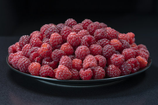 Fresh, ripe, juicy red raspberry background, close up berry, macro