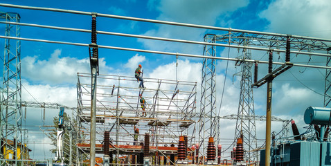 men at work electricity distribution primary substation workers 