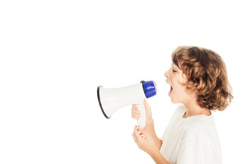 Fototapeta premium side view of cute little boy yelling in megaphone isolated on white