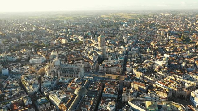 Aerial panoramic view of cityscape of Milan, historic part of city with gothic Milan Cathedral, landscape panorama of Italy from above, Europe