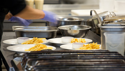 Work surface and kitchen equipment
