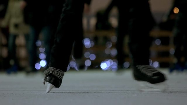People's skating feet. Blured skating feet.