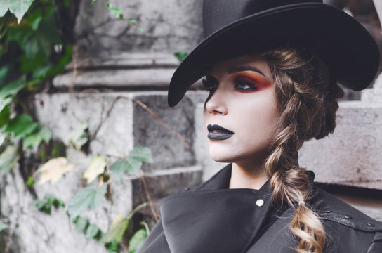 Young woman with spooky halloween make up