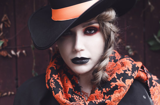 Pale taned girl with spooky make up