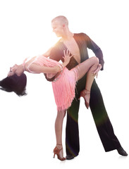Beautiful couple dancing ballroom dancing isolated on white