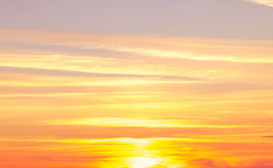 orange sunset abstraction. Blue sky, sun, clouds