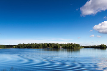 Finnish lake view with blue sky