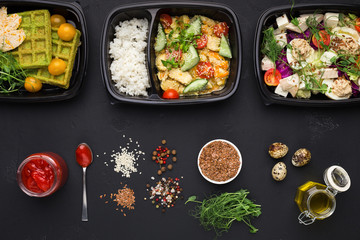 Variety of clean dieting meals in food package boxes