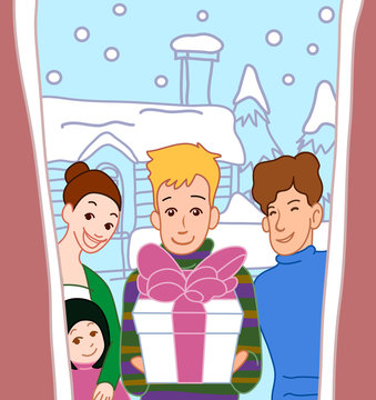 Portrait of a boy holding a gift and standing with his family at a doorstep
