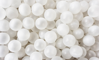 Top view white plastic bubbles pool texture. Playground background. Text space