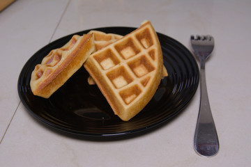 Traditional belgian waffles. Footage of pouring a dough on waffle iron. preparing a waffle