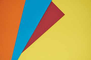 red, blue and orange on yellow background