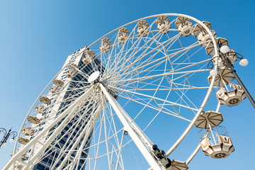 Ferris wheel with blue sky