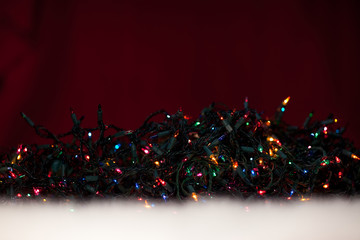 Tangles of Christmas Lights at Night by Fluffy Snow Texture