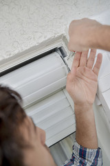 fixing the rolling blinds