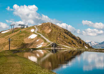 Beautiful alpine view at Leogang - Tyrol - Austria with reflections