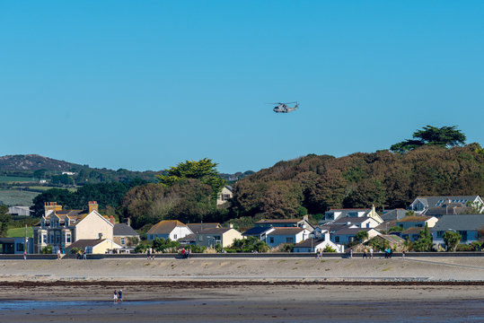Helicopter passes over the pretty village of Marazion, Cornwall