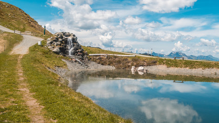 Fototapeta na wymiar Beautiful alpine view at Leogang - Tyrol - Austria with reflections