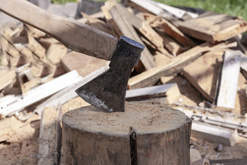 Cut logs wood and old axe
