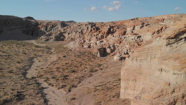 Aerial Shot of Sandstone Rock Formation in Desert Canyon