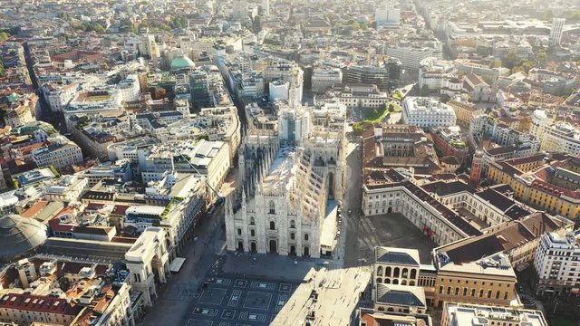 Aerial panoramic view of cityscape of Milan, historic part of city with gothic Milan Cathedral, landscape panorama of Italy from above, Europe