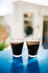 Two glasses of greek cold coffee on the table