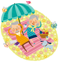 Elderly couple relaxing on beach