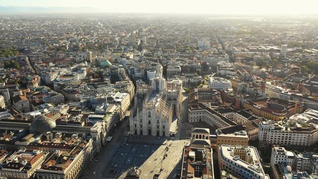 Aerial panoramic view of cityscape of Milan, historic part of city with gothic Milan Cathedral, landscape panorama of Italy from above, Europe