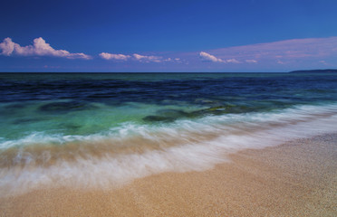 Beautiful summer landscape with sea waves on the beach
