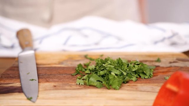 Step by step. Cutting vegetables to make filling for empanadas