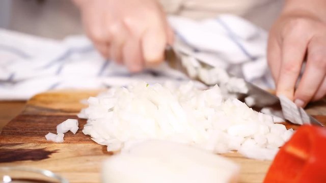 Step by step. Cutting vegetables to make filling for empanadas