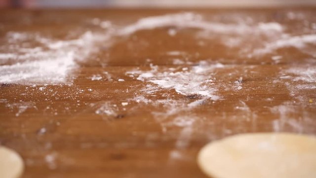 Step by step. Rolling dough for home made empanadas