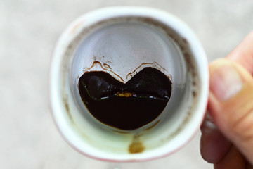 Heart shape made of coffee grounds