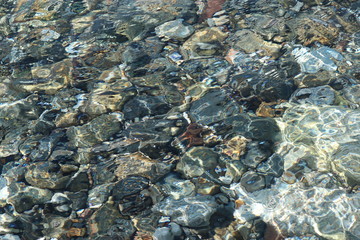  Stones in the clear water of the Mediterranean sea