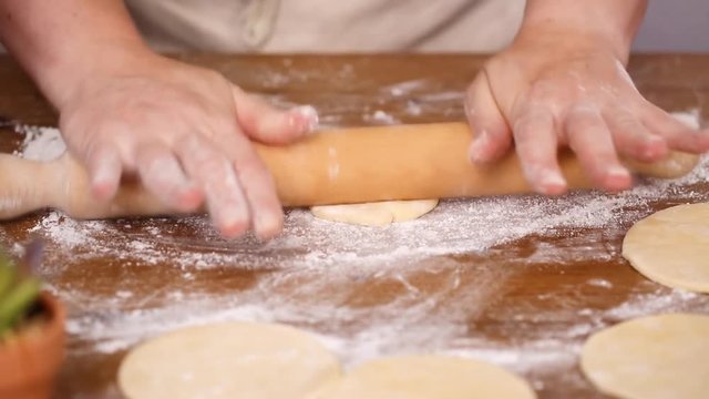 Step by step. Rolling dough for home made empanadas