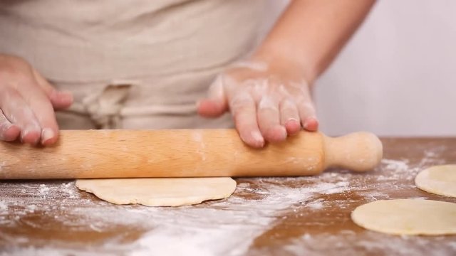 Step by step. Rolling dough for home made empanadas