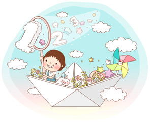 Boy sitting in paper boat