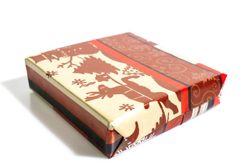 Red christmas gift isolated in a white background