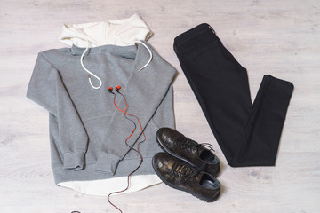 Teen clothing set: grey sweatshirt, black jeans and boots in military style