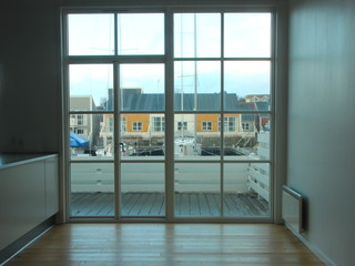 Empty Room with View to Harbor Houses