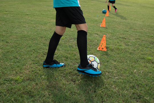 Soccer player on a field.
