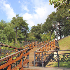 Fototapeta na wymiar Staircase in the park. Autumn Park