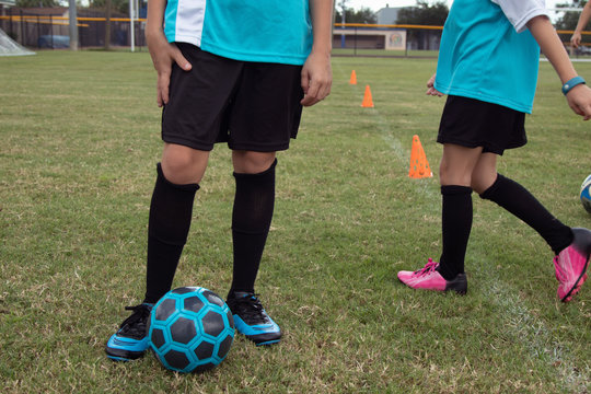 Soccer player on a field.