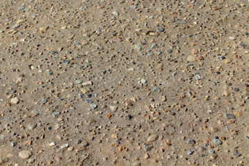 Old gray asphalt. Close-up. Background. Texture.
