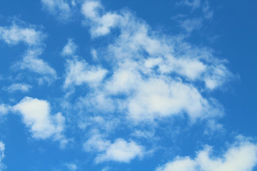 Beautiful blue sky and white cumulus clouds. Background. Landscape.