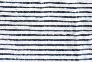 Blue and white striped textile background close up