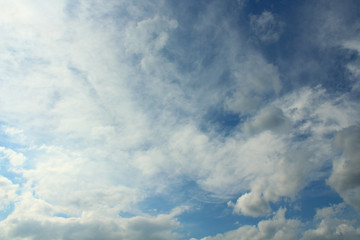 Beautiful blue sky and white cirrus and cumulus clouds. Background. Landscape.